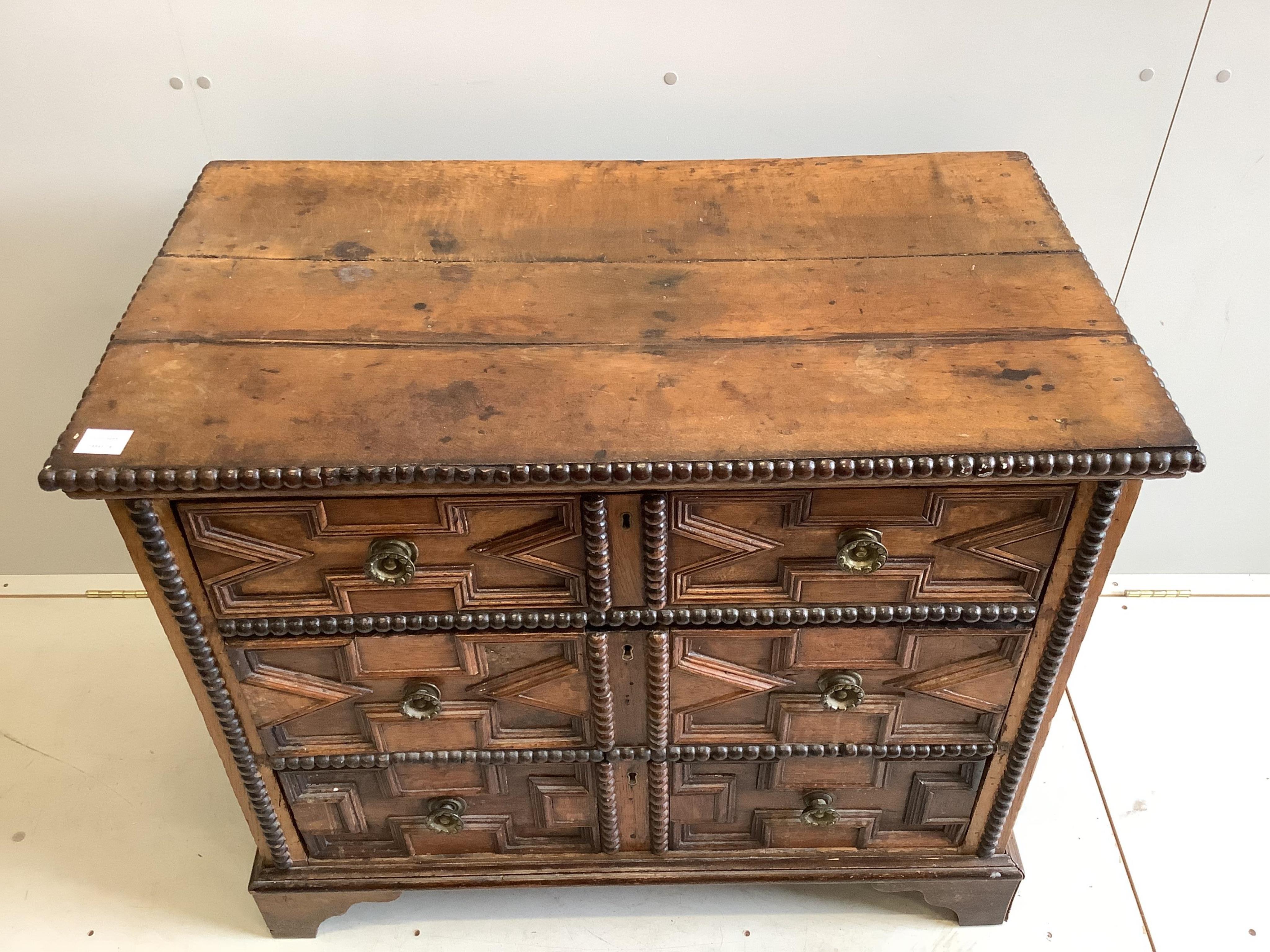 A 17th / 18th century oak chest, width 98cm, depth 56cm, height 84cm. Condition - fair